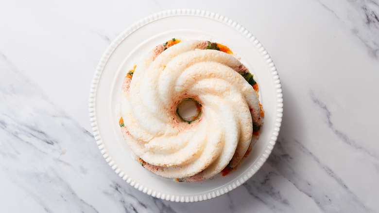 sushi bundt cake on cake stand