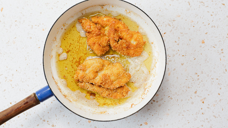 Fried chicken in pan