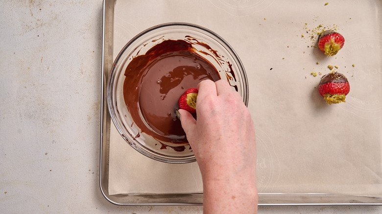 dipping strawberries in chocolate