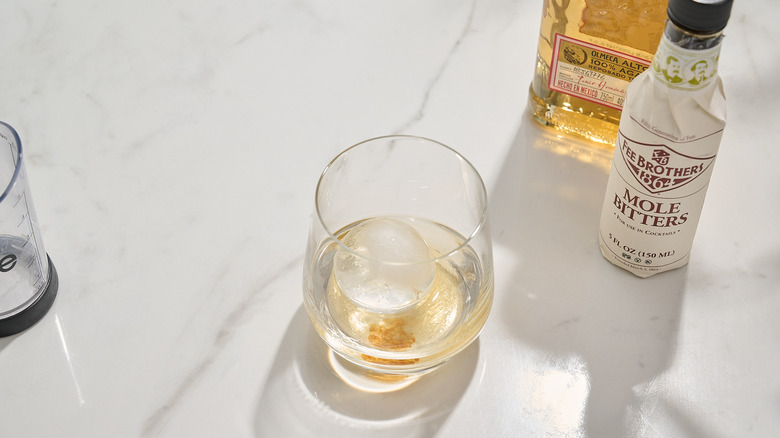 tequila and bitters in a rocks glass