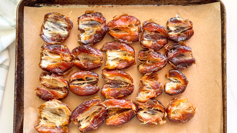dates opened on baking sheet