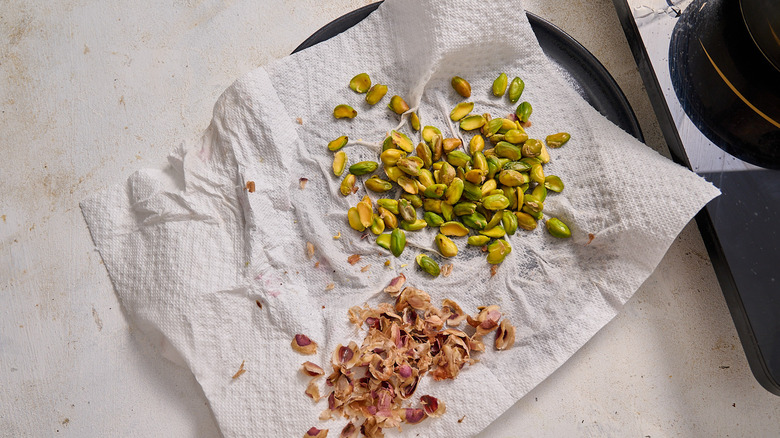 removing the skins from pistachios