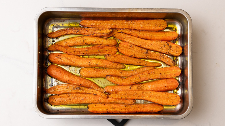 part roasted carrots in tray