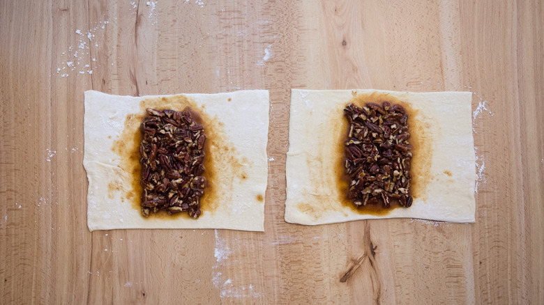 Partially made pastry on table