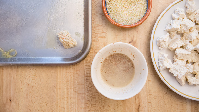 breaded tofu on baking pan
