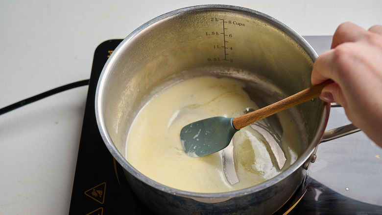 heating butter and cream in a pot