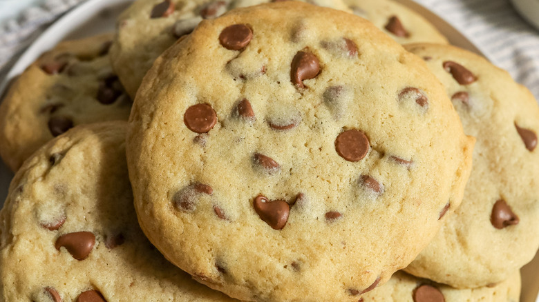 Stack of chocolate chip cookies on plate