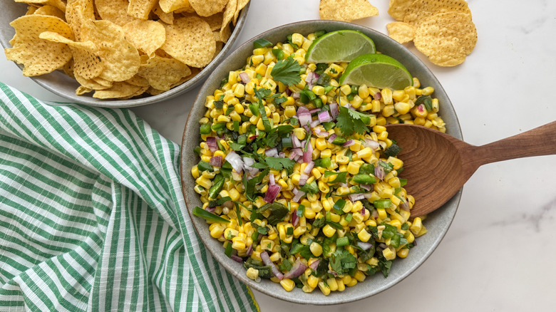 bowl of salsa with chips