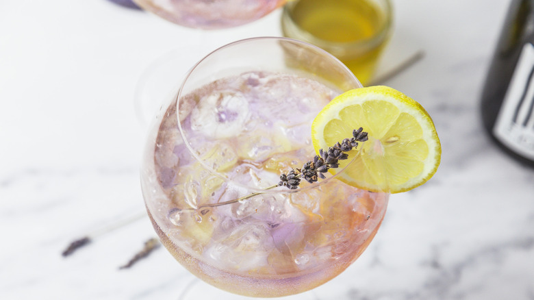 Overhead view of a lavender spritz cocktail.