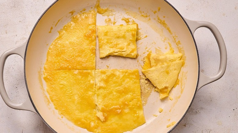 Folded eggs in large skillet
