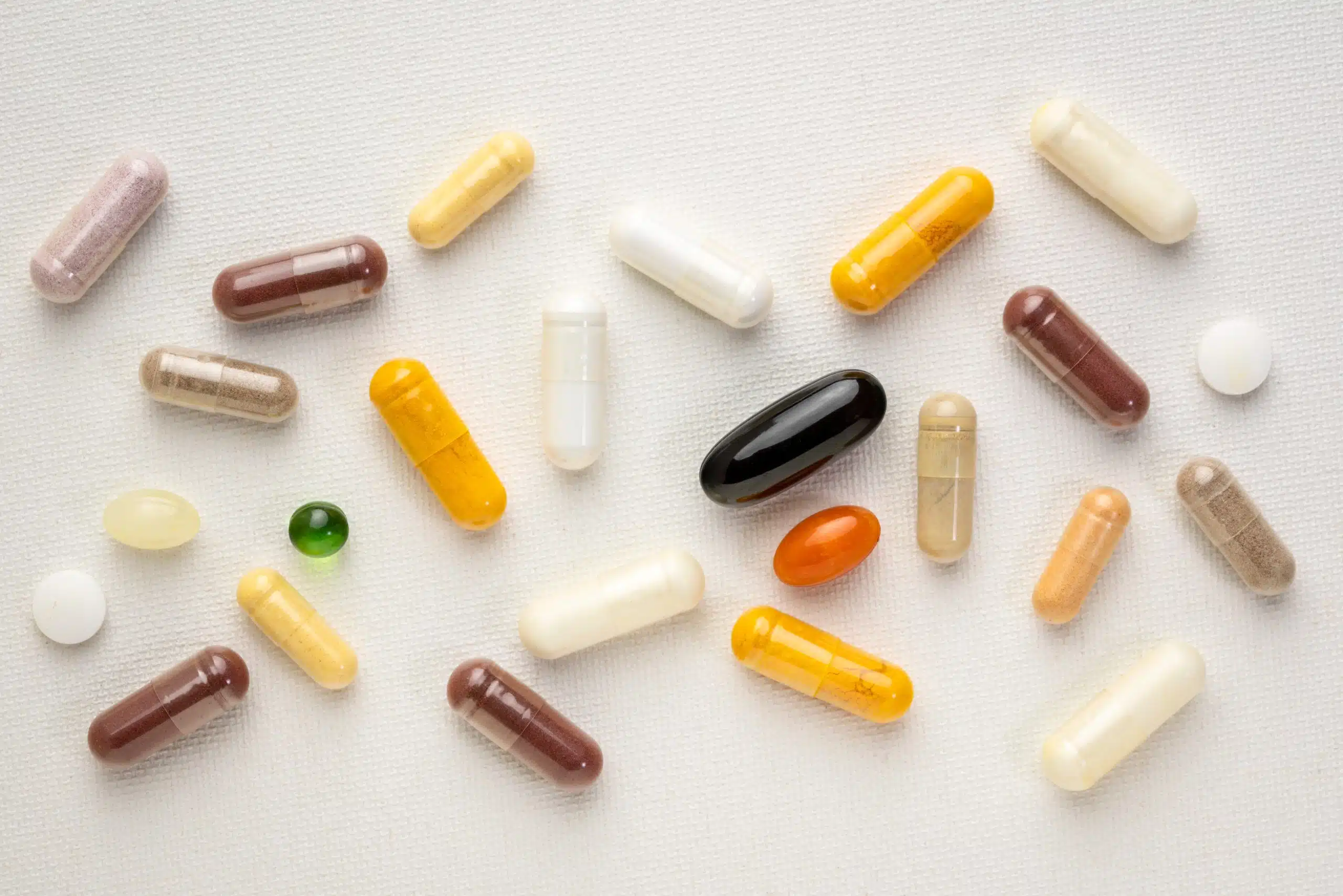 Vitamins and supplements on a white background