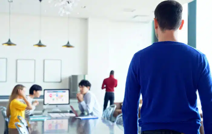 Office environment with a group of professionals working together