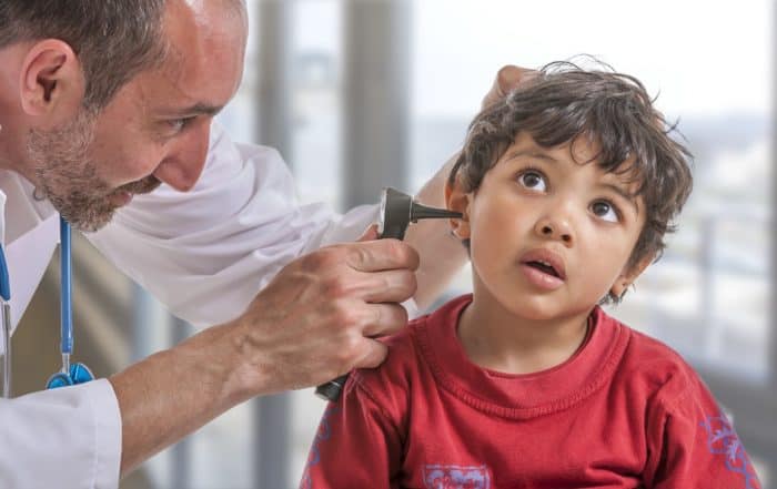 ENT medical examination with the otoscope, in one child