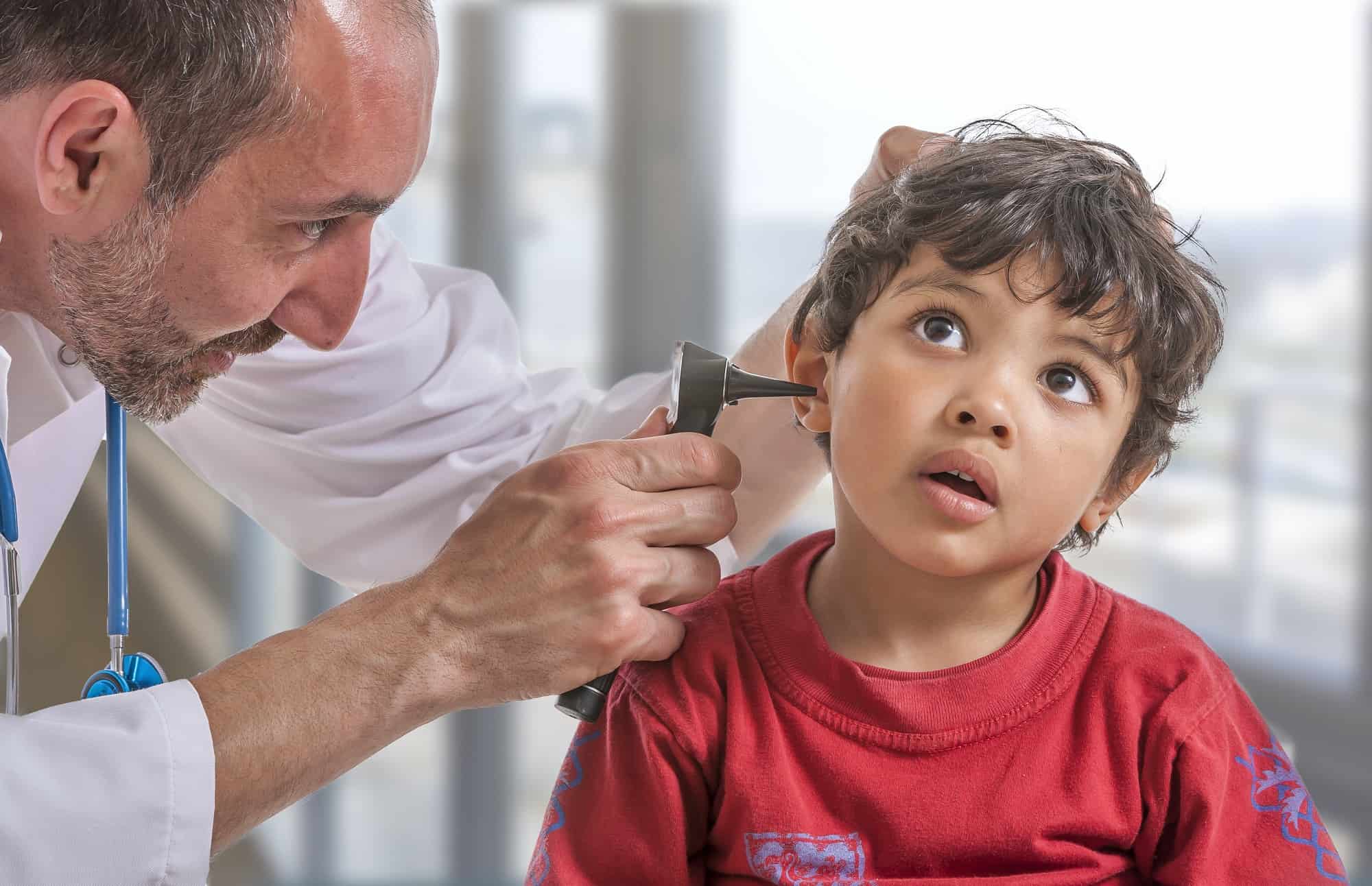 ENT medical examination with the otoscope, in one child