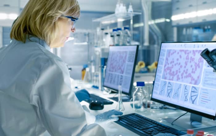 Doctor analyzing data and conducting research in a lab setting