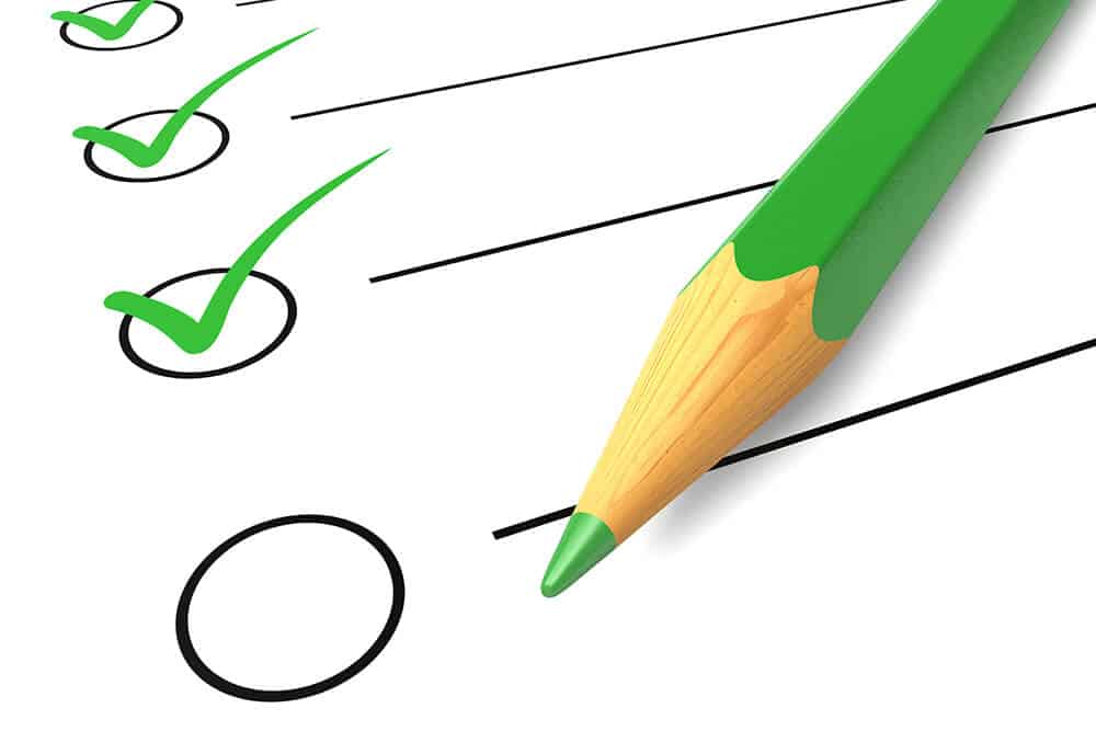 checklist and green pencil