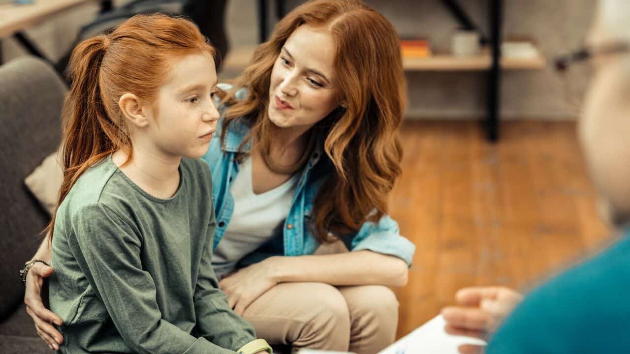 Mother and daughter at a doctor's appointment