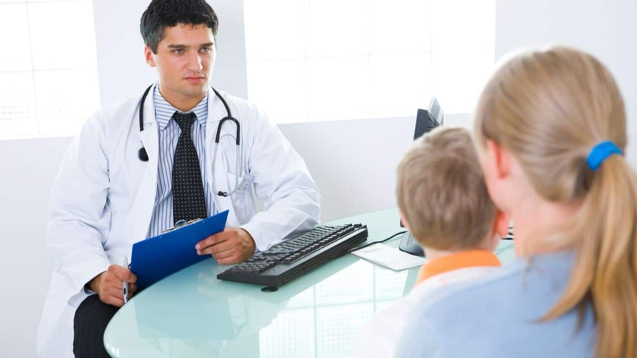 Mom and child in a doctor's office for a consultation