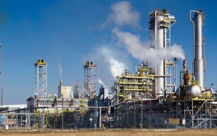 Industrial factories releasing environmental toxins into the air