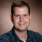 Professional headshot of a person