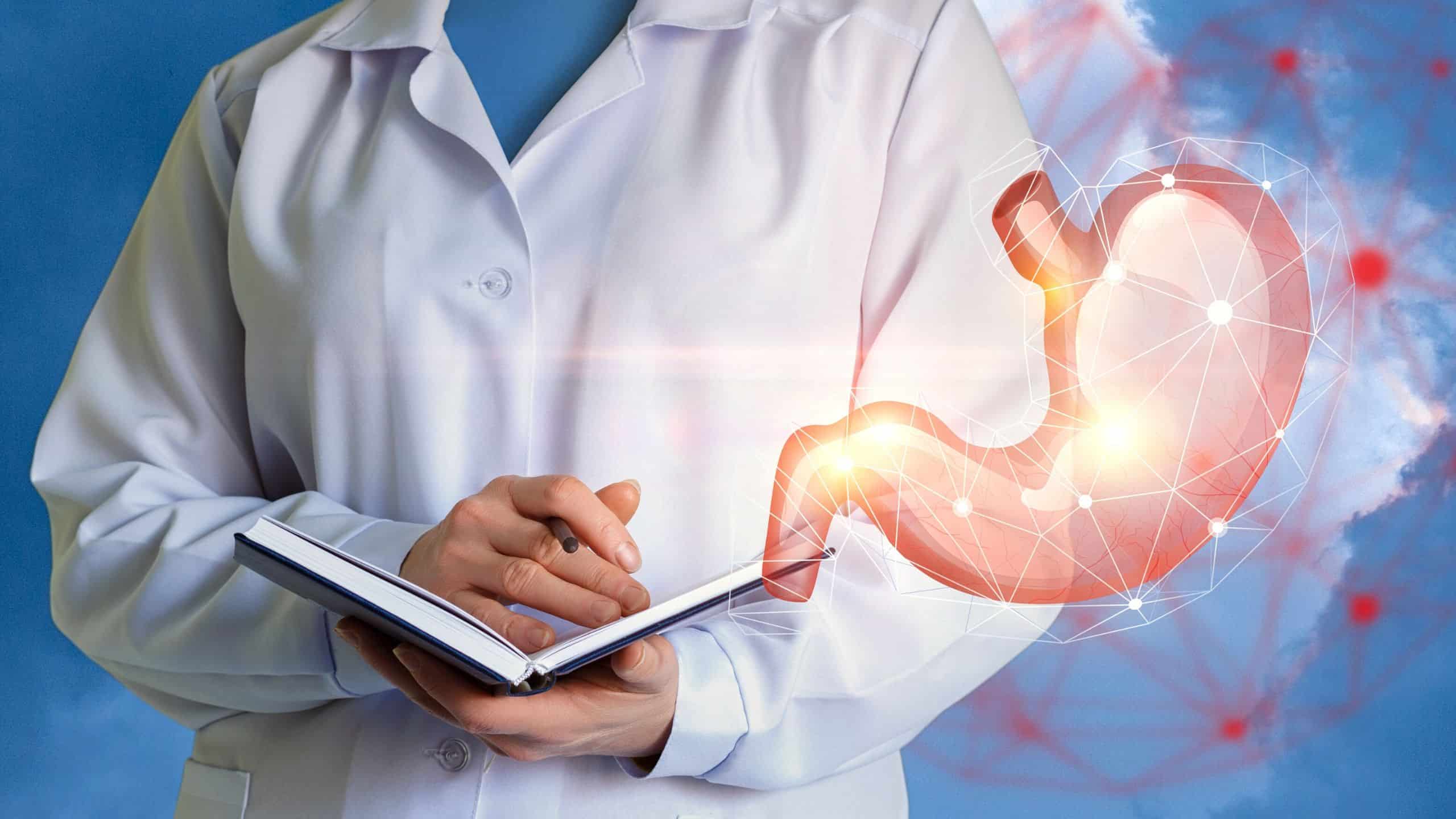 Medical professional holding a notebook while standing